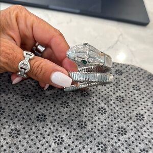 Sparkling Silver Snake Bracelet with Green Accents